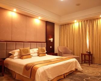 Jiuhuashan Center Hotel - Chizhou - Habitación