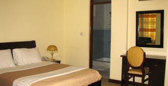 Joshmal Hotels - Arusha - Soveværelse