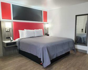 Money Saver Motel - Newport - Bedroom