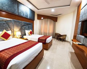 Hotel Anand International - Bodh Gaya - Habitación