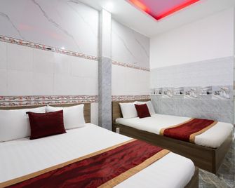 POP 1320 단센터 머우팀 호텔 - 디스트릭트 12 - 투언안 - 침실