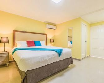 Rooi Santo Apartments - Oranjestad - Schlafzimmer
