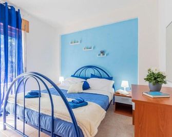 Hotel Residence il villaggio Lì cylentos Policastro Scario a 100 mt dal mare - 폴리카스트로 부센티노 - 침실