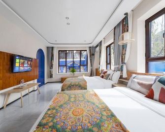 Yining Youjia Laike Homestay - Ili - Habitación