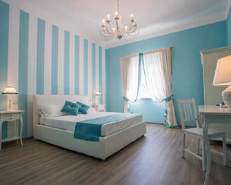 Les Suites Magnolia - Olbia - Schlafzimmer
