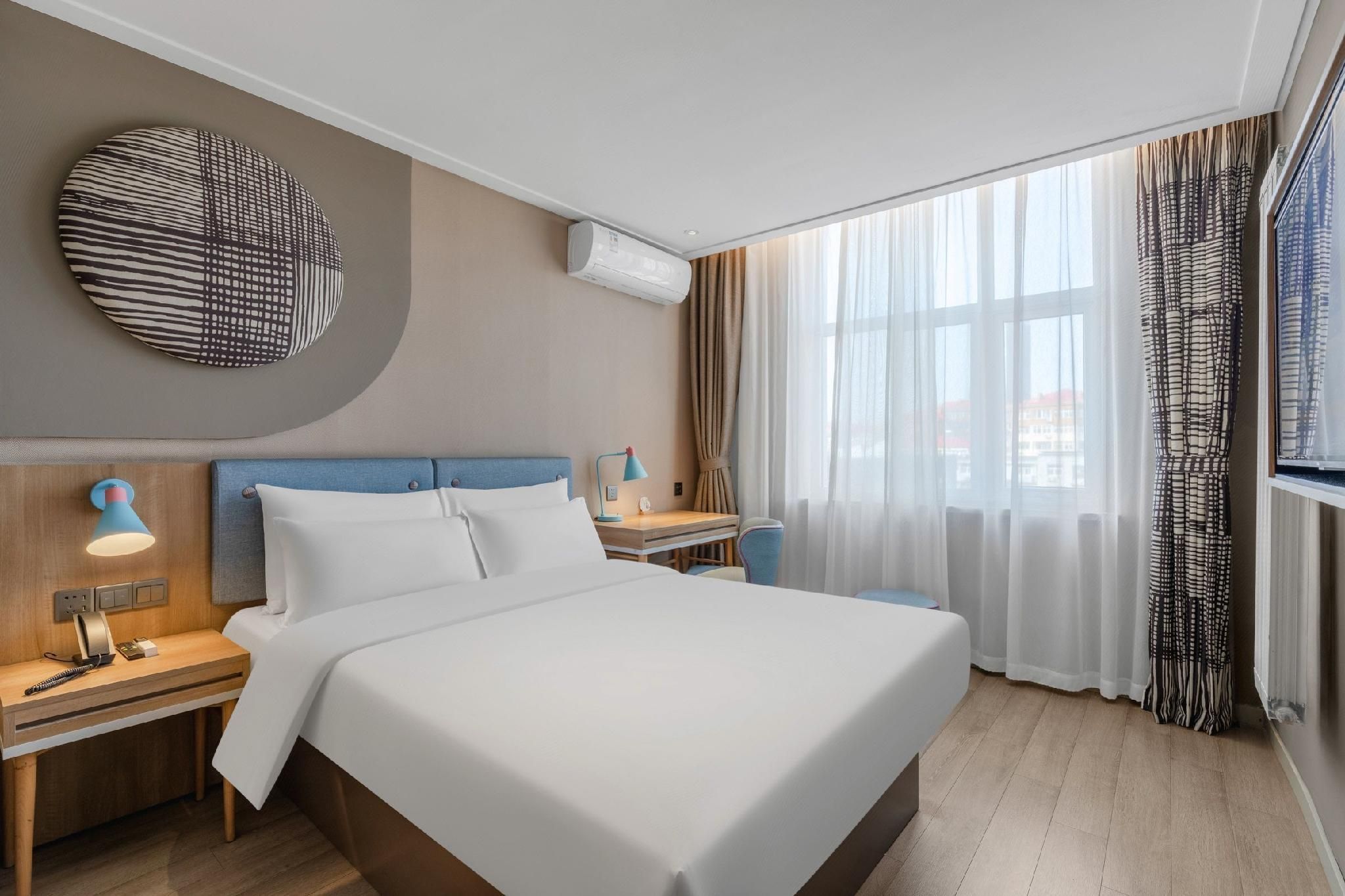 Home Inn Neo Qingdao Shandong Road Central Business District Wanda Plaza - تشينغداو - غرفة نوم