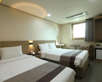 Golden City Hotel Dongdaemun - סיאול - חדר שינה