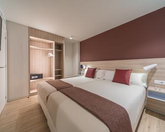 Hotel & Aparthotel Cosmos - לס אסקלדס - חדר שינה