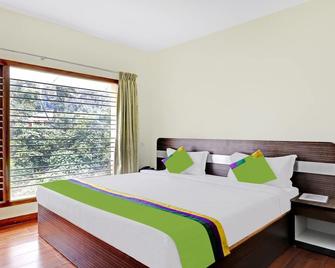 Treebo Aall Season - Kodaikanal - Schlafzimmer