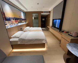 Huifeng Hotel - Shaoguan - Camera da letto