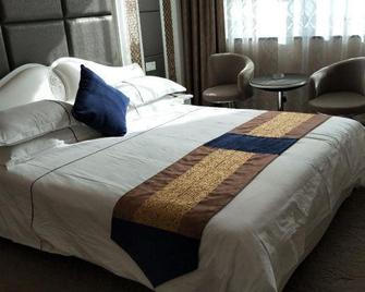 Xiang Zhi Li Hotel - Hami - Bedroom