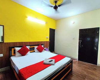 Goroomgo Hotel Paradise Varanasi - Varanasi - Schlafzimmer