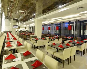 Swiss-Belhotel Jambi - Jambi - Restaurant