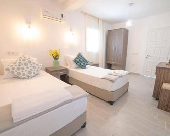 Madda Hotel - Golturkbuku - Schlafzimmer