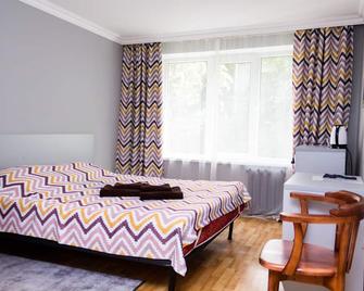 هوتل تاهار - ألماتي - غرفة نوم