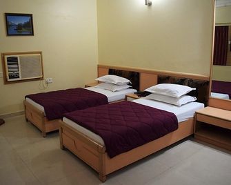 Hotel Valiant - ואדודרה - חדר שינה