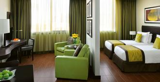 Mövenpick Hotel Apartments Al Mamzar Dubai - Dubai - Phòng ngủ