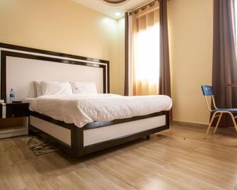Trisek Hotel - Hoima - Habitación