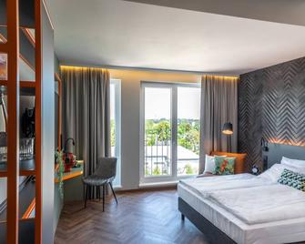 Loginn Hotel Berlin Airport - Berlin - Schlafzimmer