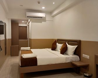 Hotel Sagar Presidency By Buesoco Hosp. Pvt. Ltd. - Daman - Schlafzimmer
