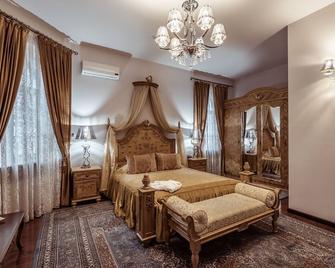 إيشان كالا بريميوم كلاس هوتل - تاشكينت - غرفة نوم