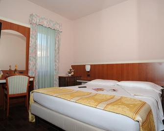 Agnello - Taino - Habitación