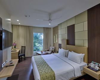 Grand Continent Hosur A Sarovar Portico Affiliate Hotel - Hosūr - Bedroom