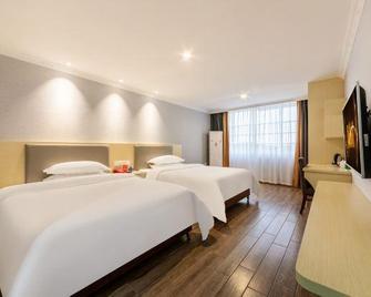 Kaitong Business Hotel - Ji'an - Habitación