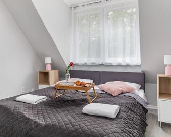 Family Three Bedroom Apartment Podczele Sunrise by Renters - Kolobrzeg - Bedroom