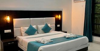 Hotel Rishikesh Inn By Wraveler Hotels - ริชิเคช - ห้องนอน