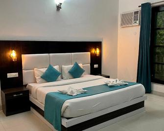 Hotel Rishikesh Inn By Wraveler Hotels - Rishikesh - Habitación