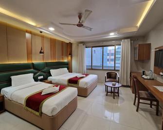 Darcys International Hotel - Butwāl - Bedroom