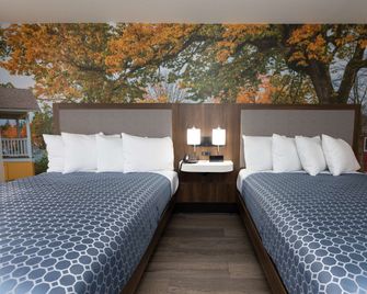 Bhagat Hotels Stone Mountain Atlanta BW Signature Collection - Tucker - Schlafzimmer