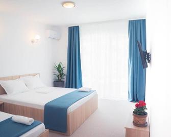 Mera Holiday Resort - Venus - Bedroom