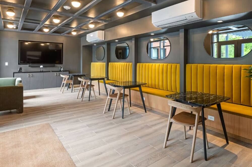 Restaurant view of Award Rentals in Washington DC. Multiple levels of amenities and shared space.