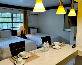 Colony Club Inn & Suites - Nassau - Soverom