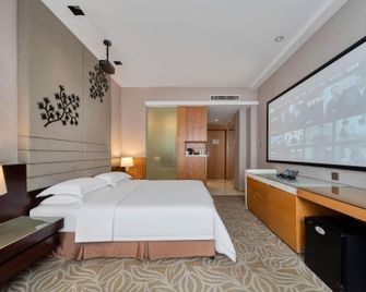 Ningbo East Harbour Hotel - Ningbo - Schlafzimmer