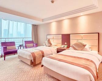 Jiangsu Phoenix Palace Hotel - نانجينغ - غرفة نوم