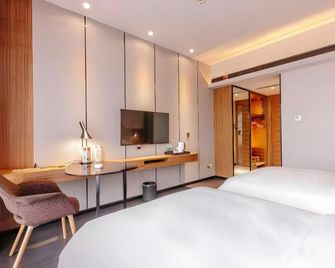 Borrman Hotel Kunming Changshui Airport Center - Kunming - Bedroom