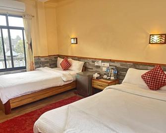 Peacock - a family-run hotel - Sauraha - Bedroom