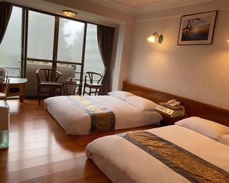 Ali-Shan Kaofeng Hotel - Alishan Township - Schlafzimmer