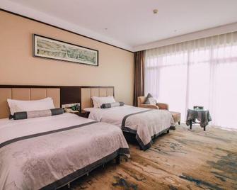 Grand Cloud View Hotel - Zibo - Camera da letto