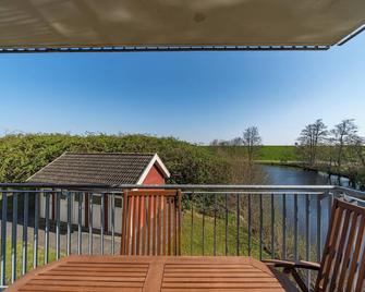 Apartment mit Sauna, Whirlbadewanne und Balkon an der Graft mit Blick zum Deich! - Schillig - Balkon