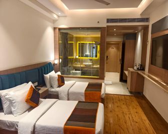Hotel Golden Orchid - Lucknow - Bedroom