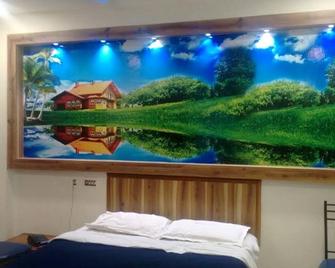Hotel Manickam Grand - צ'נאי - חדר שינה