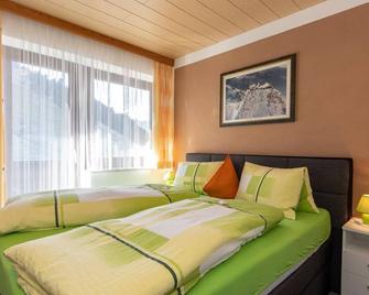 Comfort room Aktiv with shower/WC and balcony - Pension Sonnblickhof - Rauris - Bedroom
