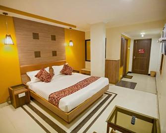 Hotel Maneck Residency - Ooty - Soveværelse