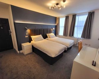 At Caledonia - דגלאס (האי מאן) - חדר שינה