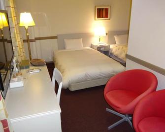 Matsumoto Wellton Hotel - מאטסומוטו - חדר שינה