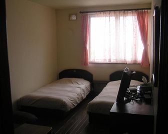 Pension Young House - Furano - Bedroom